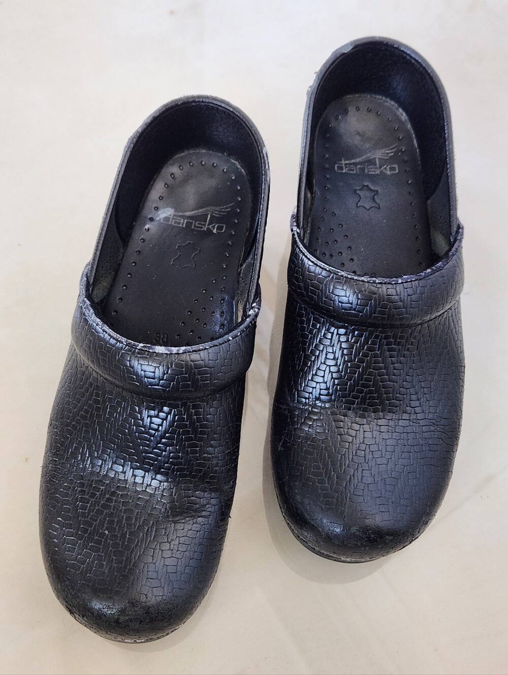 Dansko Basketweave Pattern Black Clogs with Textured Sole
